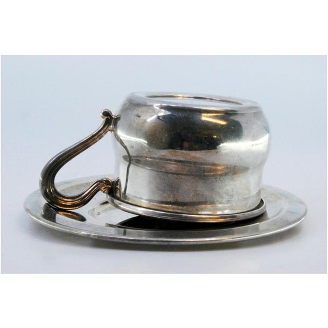 Metal Cup and Saucer in Plain Silver with Embossed Handle For Sale - Image 7 of 8
