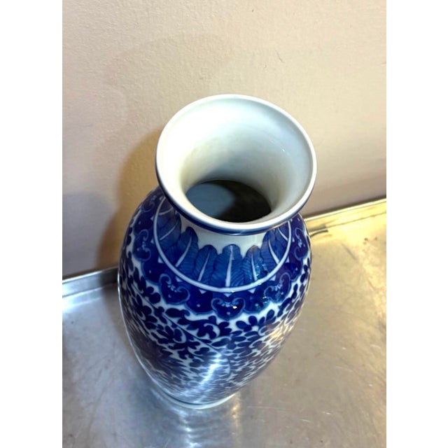 Chinese blue/white ceramic tall vase. Excellent condition.