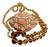 1930s Art Deco Bohemian Amber Faceted Glass Bead Necklace & Faux Coral Brass Filigree Brooch, 2 Pieces For Sale