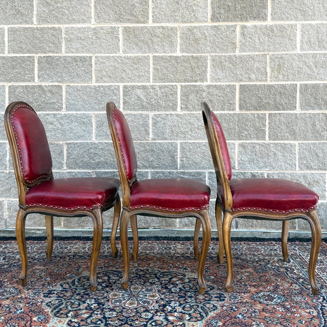 Mid 20th Century Tacked Red Vinyl & Fruitwood French Louis XV Fauteuil Dining Chairs - Set of 3 For Sale - Image 10 of 17