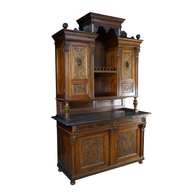 This magnificent antique Renaissance Revival buffet or hutch stands as a monumental statement of late 19th-century...