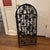 Italian iron wine cage of arched form with door featuring bunches of grapes and foliage, door with latch so it can be...