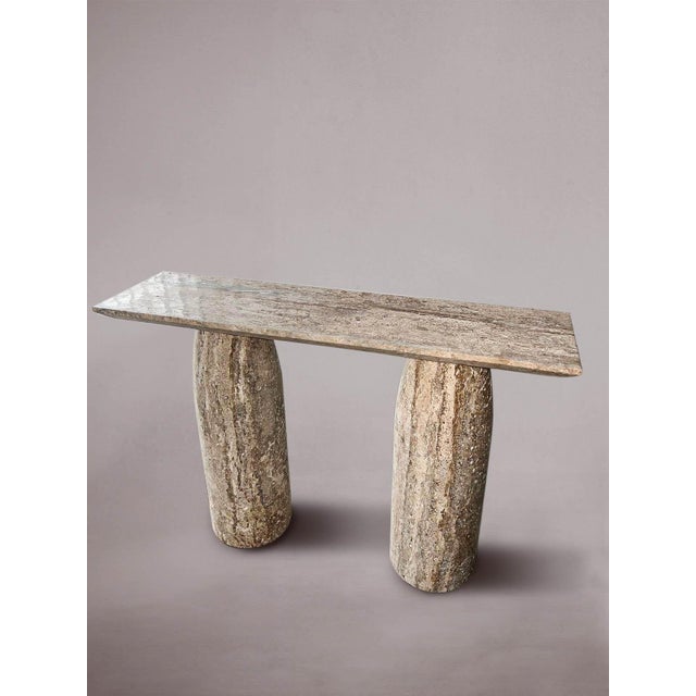 Crafted from premium silver travertine, this console table exudes sophistication and timeless charm. Its minimalist...