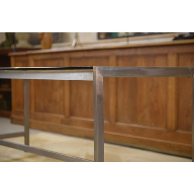 Desk in Brushed Stainless Steel and Black Smoked Glass, 1980s, in Very Good conditions. Designed 1980 to 1989