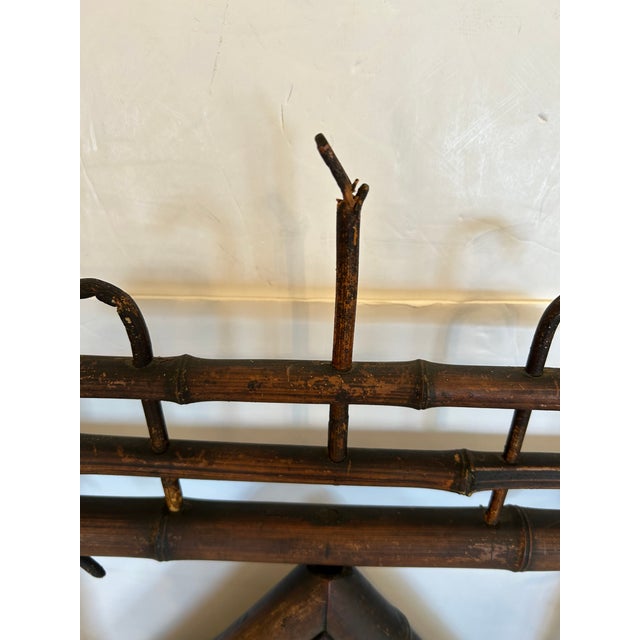 Antique rustic Adirondack style mirror and coat hanger having bamboo structure, diamond shaped mirror 12.5 x 17, and...