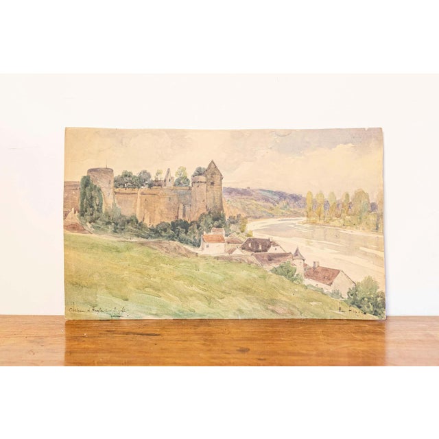 A French watercolor on paper painting from the 20th century depicting a medieval château along the Vienne river. This...