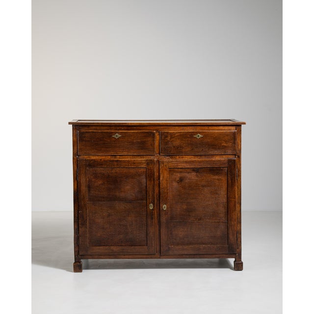 A character-rich buffet with original surface wear that enhances authenticity. The aged finish highlights its history...