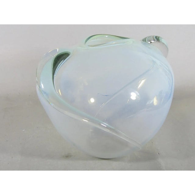 1982 dated Mid Century Art Glass vase by Thomas Buechner. Two swirl handles.