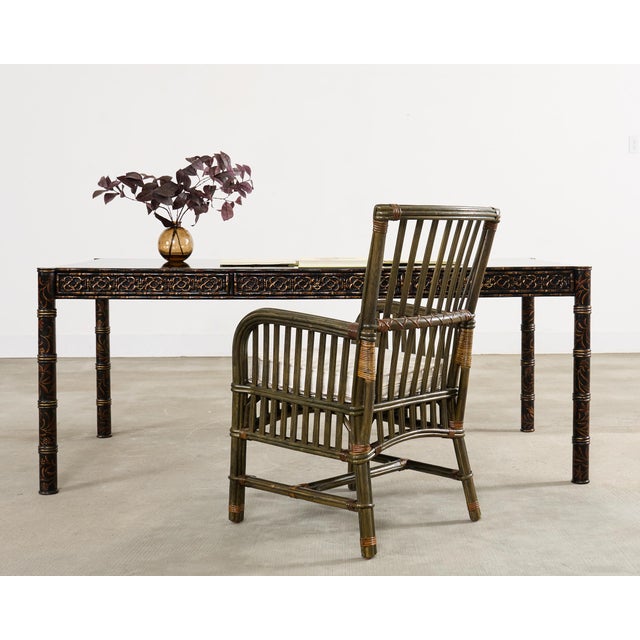 This striking bespoke Dennis and Leen "Regency" black lacquered desk showcases a deep ebonized raisin crackle lacquer...