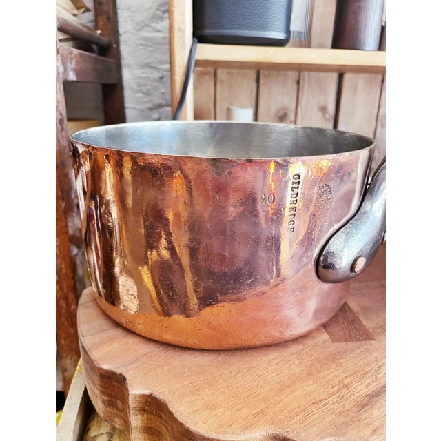 A stunning antique circa early 1900s copper cooking pot with new hand applied tin lining and a riveted iron handle, made...