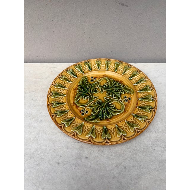 French Majolica acanthus leaves plates, circa 1880. Rare yellow background usually found in green.