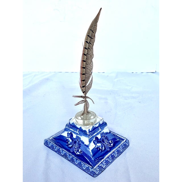 Exceptional antique English blue and white transferware porcelain inkwell. Featuring a striking pyramidal silhouette, the...