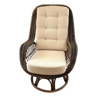 Lewittes Furniture 1970s Rattan/Wicker Swivel Chair For Sale