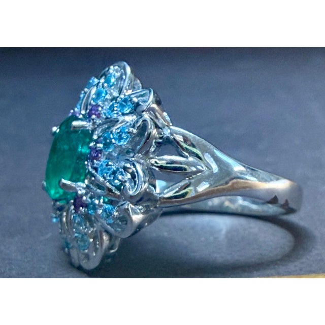A classic, Cocktail ring 1.5 Carat Natural Oval Cut Emerald Ring With Blue Topaz &amp; Amethyst 14 Karat Gold Oval cut...