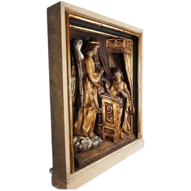 Germany, 19th Century An impressive and finely carved wooden relief depicting the Annunciation, the sacred moment in which...