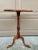 A handsome Georgian-style drinks table crafted in rich solid cherry wood. The elegant turned pedestal and tripod base draw...