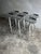 A striking set of six industrial bar stools in aluminium, featuring a clean and functional design. These stools combine...