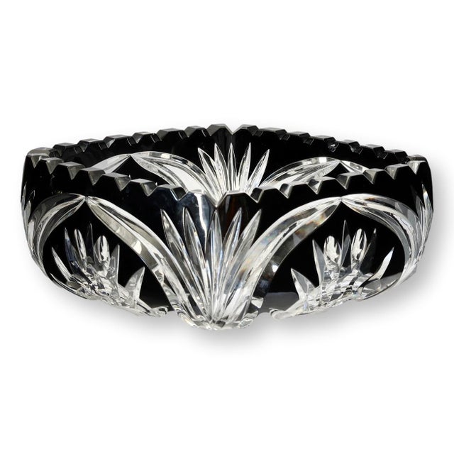Mid 20th century Bohemian cut crystal bowl in dramatic black onyx overlay glass, deeply cut to clear with bold geometric...
