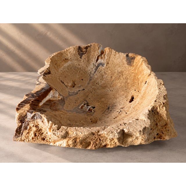 A stunning handcrafted Onyx stone bowl, carved from natural stone and showcasing the unique beauty of organic mineral...