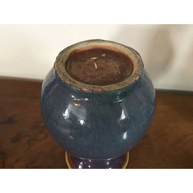 Antique 19th c. Chinese oxblood sang de boeuf porcelain baluster shape vase with flambe glaze. Measures 7.5" tall. Good...