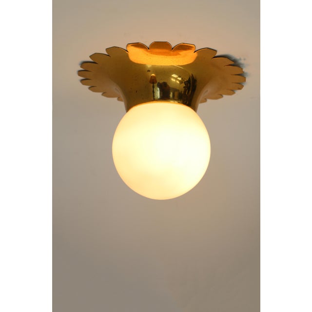 Small mid-century ceiling lamp Made in Sweden, 1960s Elegant design Brass/glass Diameter 25cm, Height 20cm 1 x E27 socket...