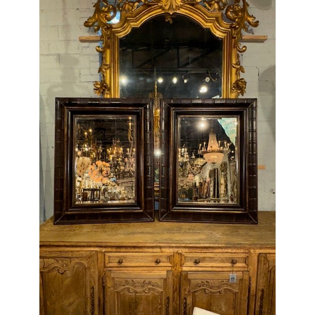 Handsome pair of vintage English leather bound mirrors. Quality is exceptional and so unique. Gorgeous! Circa 1970 35w x 45h