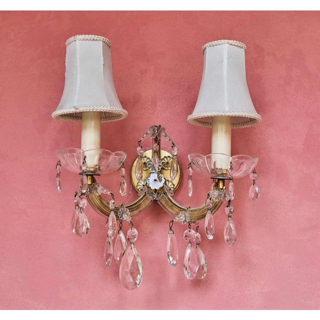 Wall lamp with hand-cut and polished crystal trimmings. Typical bowls with "olives" used on Theresian chandeliers. The...