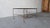 Oval Travertine Coffee Table With Hand-Forged Iron Base For Sale In Las Vegas - Image 6 of 11