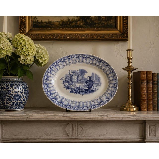 A lovely late 19th century blue and white ironstone transferware platter with classical urn decoration, architectural...