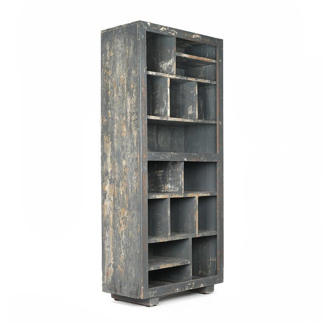 Shelf in patinated wood with 15 compartments. Vintage furniture in antique patinated teak. Has 15 storage spaces. Antique...