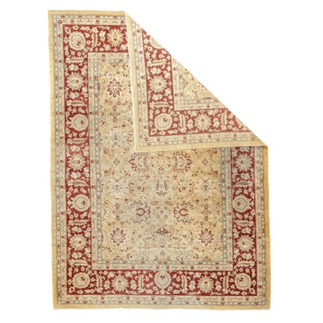 Post WWII scatters and larger pieces in Persian curvilinear styles woven in the Pakistani city of Peshawar. Medium weave,...