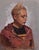 Untitled by Brian Busch | Oil on panel Portrait of a woman with short hair in a hoodie. For Sale