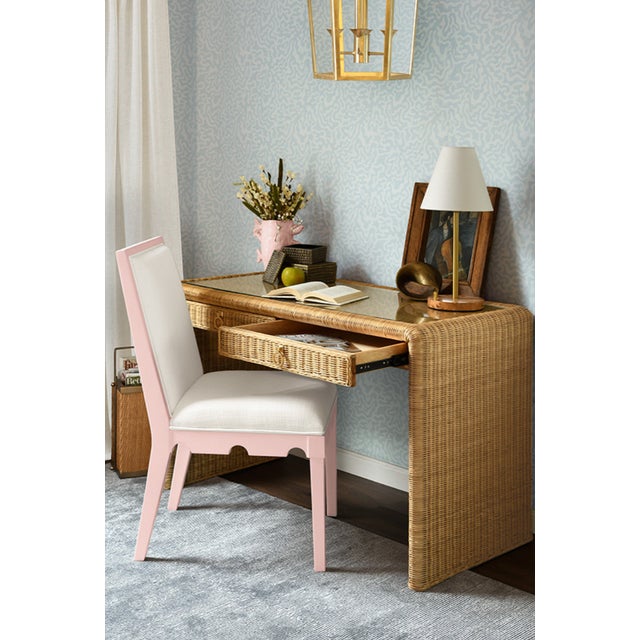 New special order item. Not vintage. Elevate your dining space with the Lanister Pink Lacquer Dining Chair, a striking...