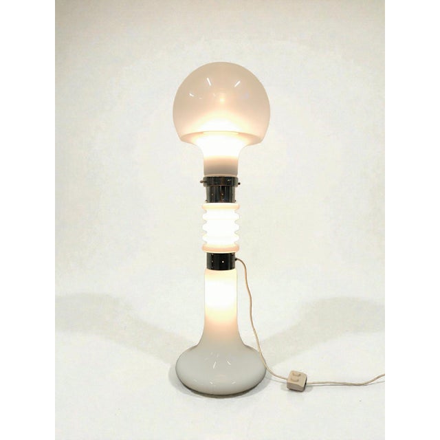 "Birillo" floor lamp attributed to Mazzega, 1960s, in Murano blown glass and chrome bands. Three elements with three...
