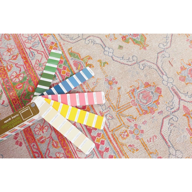 An early 20th century traditional Indian Agra cotton carpet, the beige field with a medallion trellis overall containing...