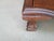 Elegant vintage Chippendale-style slant-front secretary desk featuring a rich mahogany-tone finish, gracefully shaped...