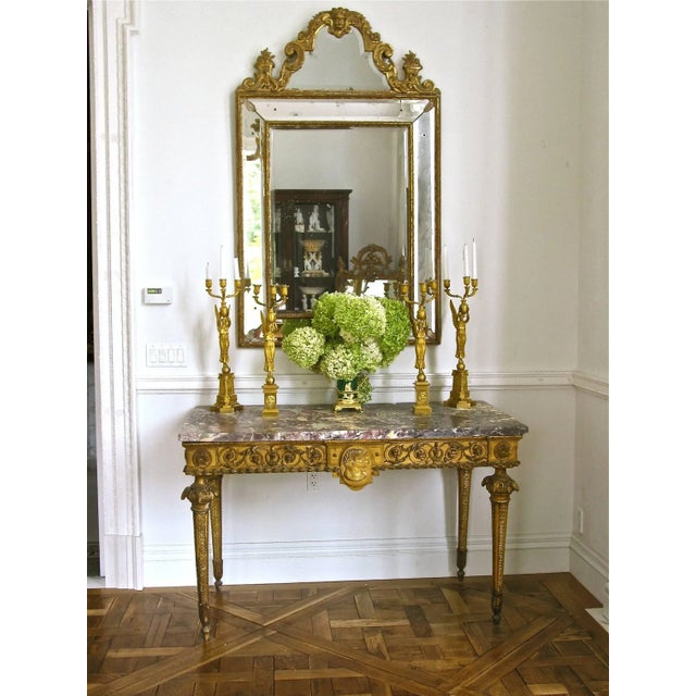 Rare Agrarian inspired Neoclassical console table. Italian, original marble slab top. Profile plaque of two women,...