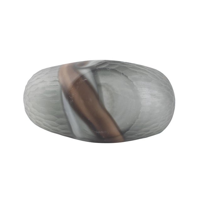 Crafted with textured glass, this vase features a striking pattern in the middle, with rich brown and smoky colors. The...