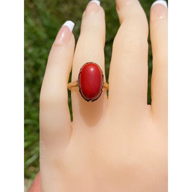 The Coconut Creek: Antique Turn of The Century Mediterranean Coral Ring. The ring centers on an approximately 10 carat...