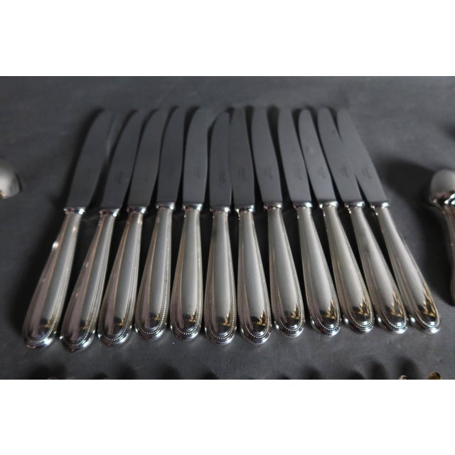 Housewife from Maison Christofle model Beads in silver metal, very good condition, almost new. It includes 61 pieces: - 12...