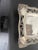 Nine inch square silver with bronze accents, footed bread/dessert tray. Came from a Richmond estate; marked with LA. Shows...