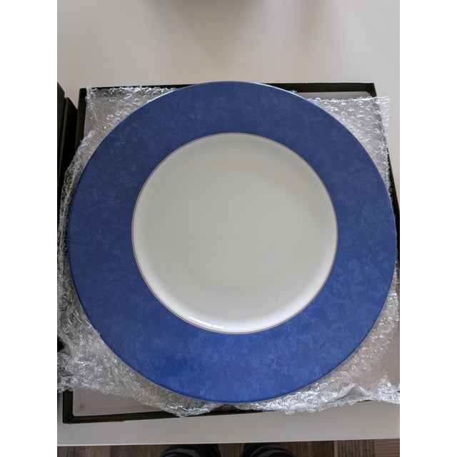 8 total plates, two per set. These are flawless and have never been used, are in the original packaging and are a...