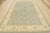 This modern traditional Ziegler rug is hand-knotted with an all-wool pile on a cotton foundation. This rug is new and in...
