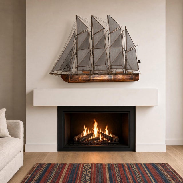 1975 copper sculpture of a sailing ship or schooner, signed C. Jeré for Curtis Jeré, the nom de plume of the company...