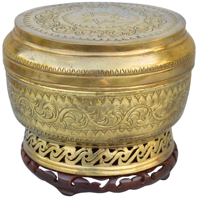 Antique highly crafted and detailed Moroccan lidded bowl with wooden stand, constructed of solid and very heavy brass....