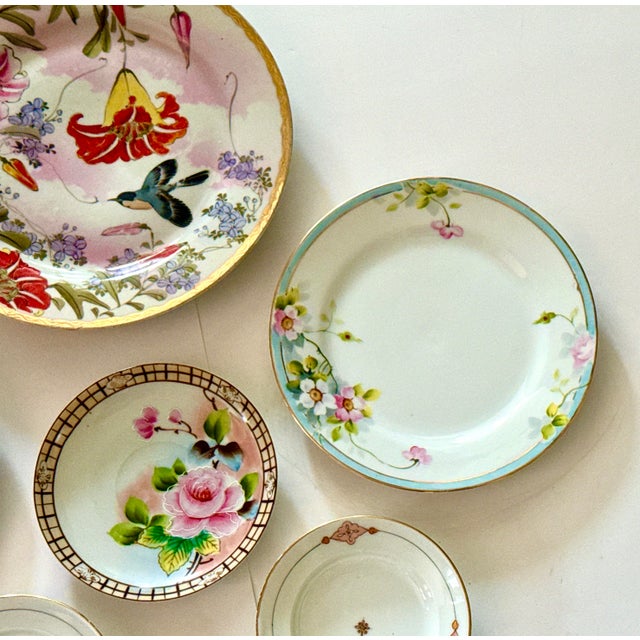 Set of 7 Mid‑Century Japanese Hand‑Painted Floral Plates A lovely mixed collection of mid‑century Japanese hand‑painted...