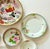 Set of 7 Mid‑Century Japanese Hand‑Painted Floral Plates A lovely mixed collection of mid‑century Japanese hand‑painted...