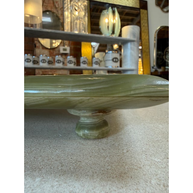 Elegant Italian bar set crafted in natural green marble, comprising a rectangular tray and six matching goblets raised on...