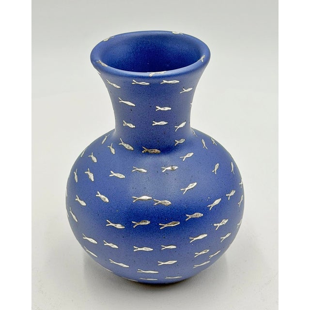 A striking cobalt blue porcelain vase designed and handcrafted in Mexico by renowned artist Emilia Castillo, celebrated...