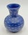 A striking cobalt blue porcelain vase designed and handcrafted in Mexico by renowned artist Emilia Castillo, celebrated...